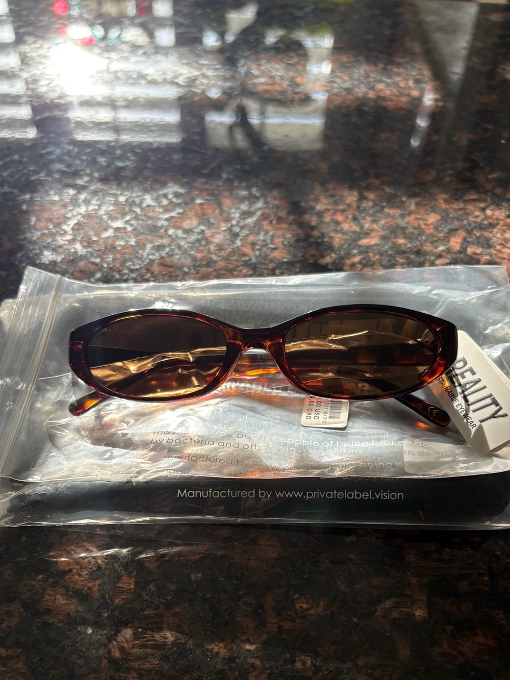 Anthropologie Reality Eyewear Slim Oval Sunglasses